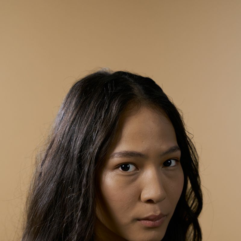 Stock portrait used for the illustrative Maya profile